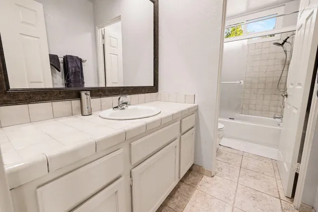 a view of a backyard with sitting area