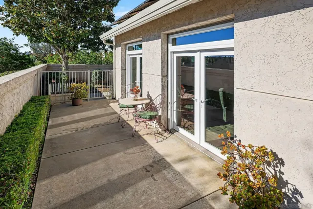 swimming pool view with a outdoor seating