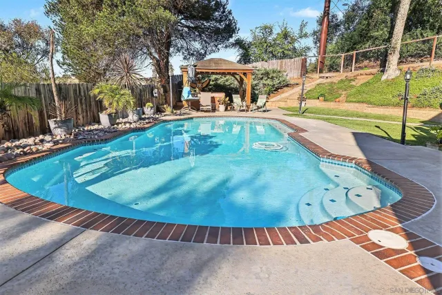 a view of patio with chairs and tables