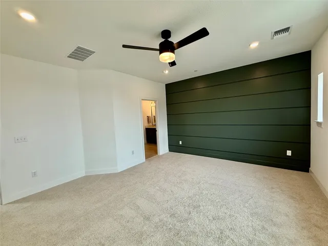 a bathroom with a double vanity sink and mirror
