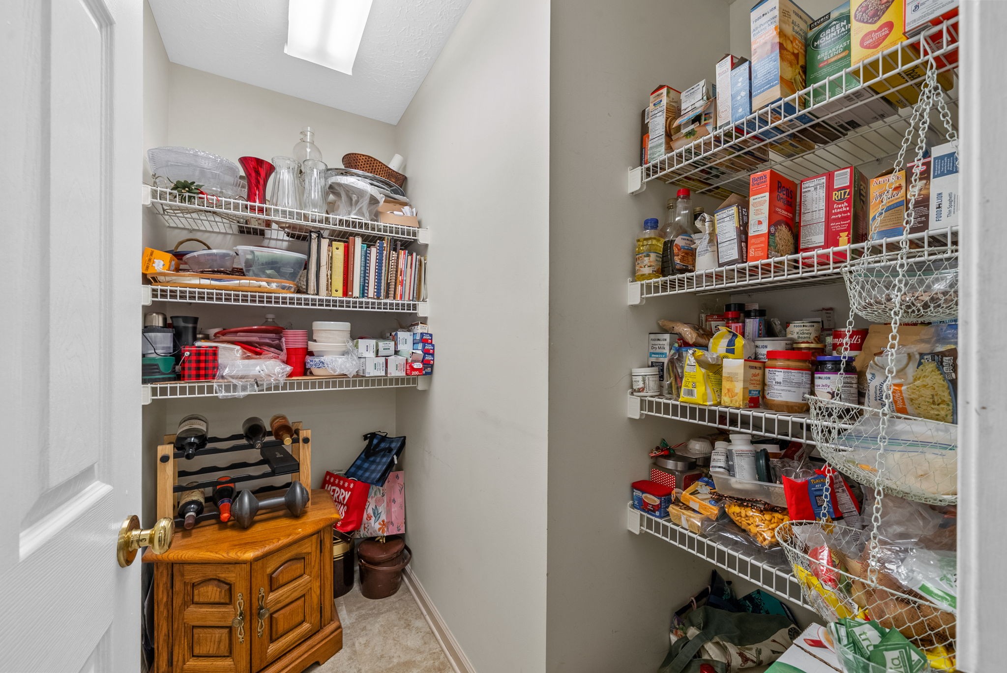 1230 Bark Ridge Circle Hopkinsville, KY 42240 - Photo 14 of 38 a room with lots of different colored cloths