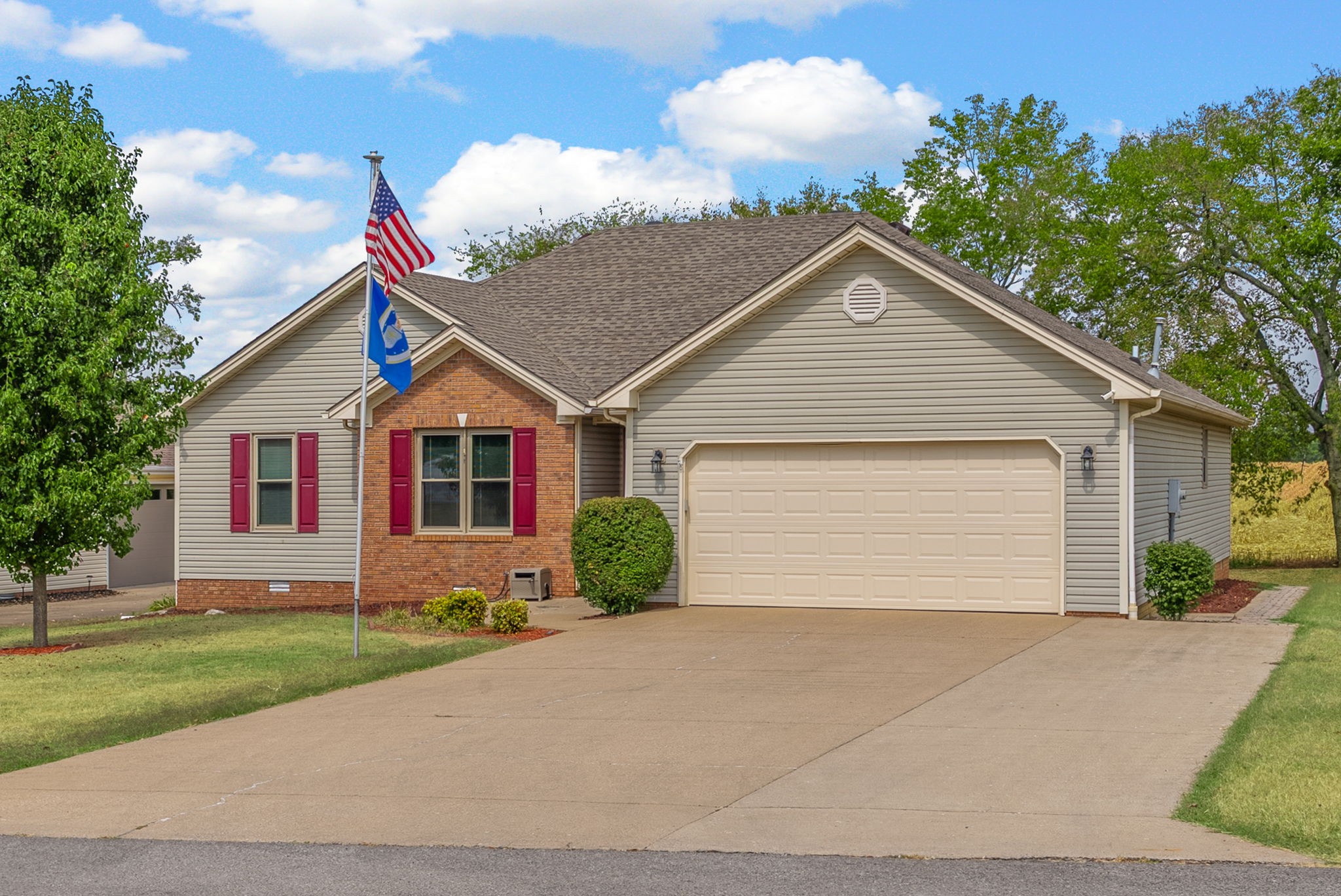 1230 Bark Ridge Circle Hopkinsville, KY 42240 - Photo 3 of 38 a front view of house with yard and green space