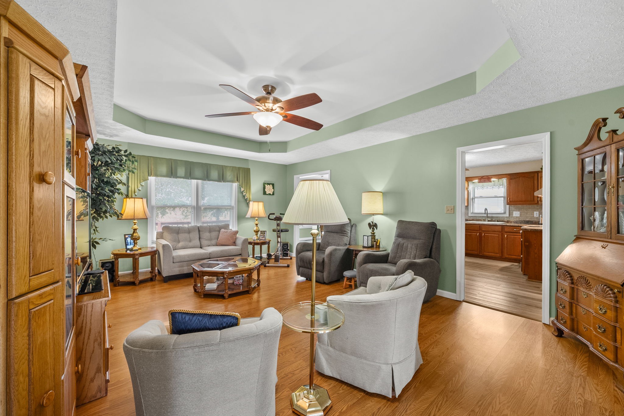 1230 Bark Ridge Circle Hopkinsville, KY 42240 - Photo 6 of 38 a living room with fireplace furniture and a large window