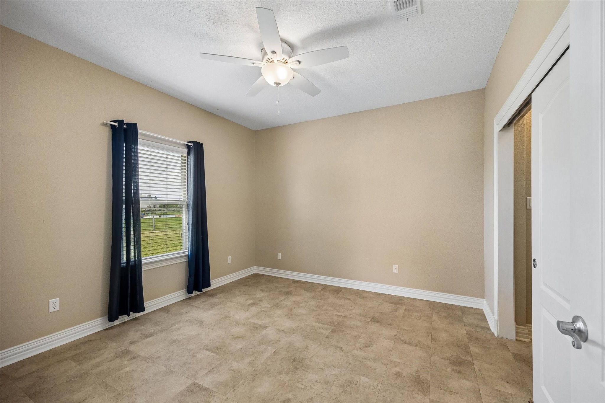 17703 Cedarhill Drive Rosharon, TX 77583 - Photo 36 of 47 a view of an empty room with a window