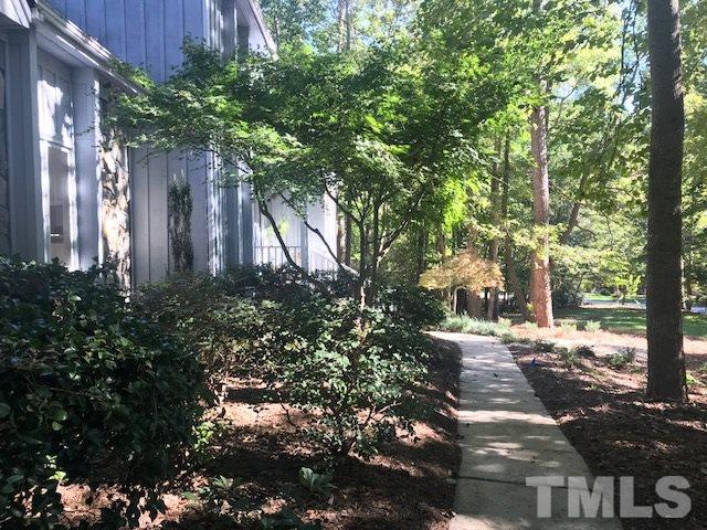 10000 Grafton Road Raleigh, NC 27615 - Photo 22 of 25 Beautifully landscped walkway to home. Private setting.