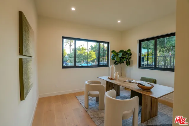 a workspace with furniture and window