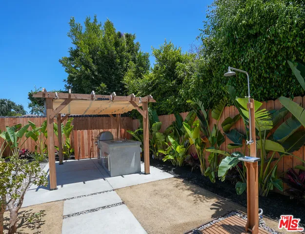 an aerial view of a house with a garden