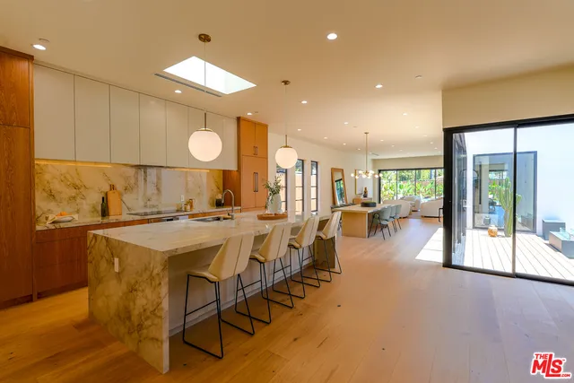 a view of a kitchen and dining room