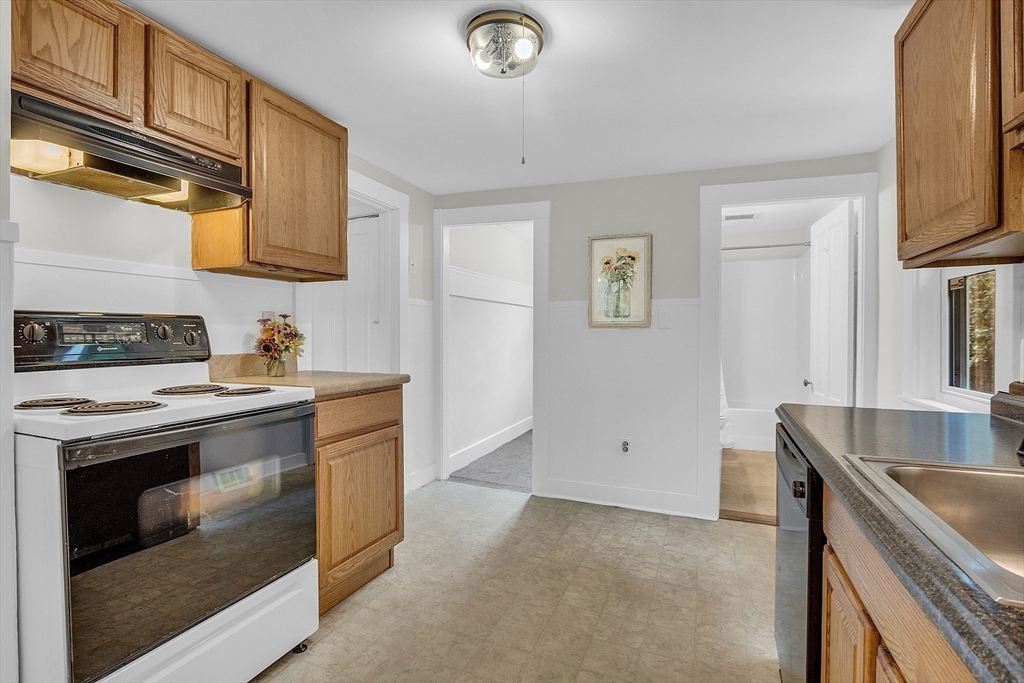 191 Westminster Road Princeton, MA 01541 - Photo 17 of 42 a kitchen with granite countertop a sink stainless steel appliances and cabinets