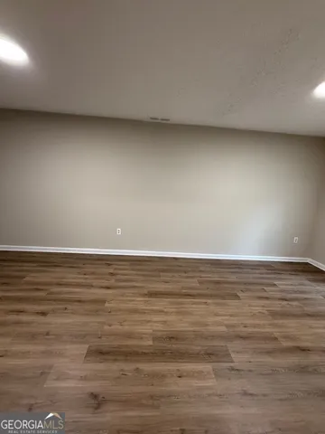 a view of a room with an empty space