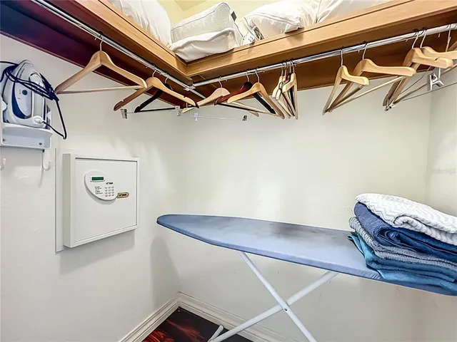a view of a livingroom with furniture window and wooden floor