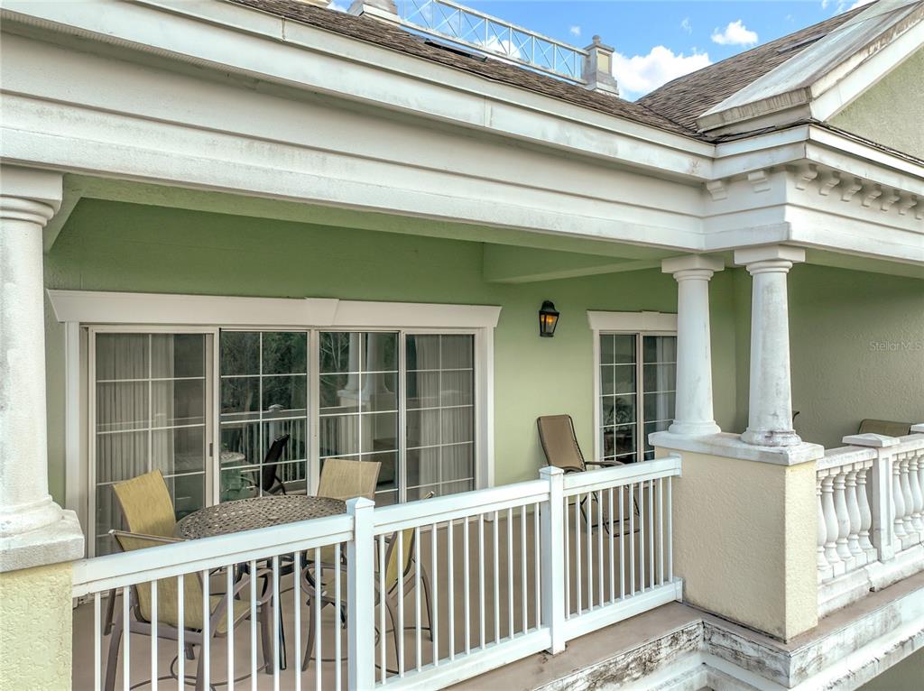 7660 Whisper Way, Unit 402 Reunion, FL 34747 - Photo 47 of 65 a view of a house with a large window