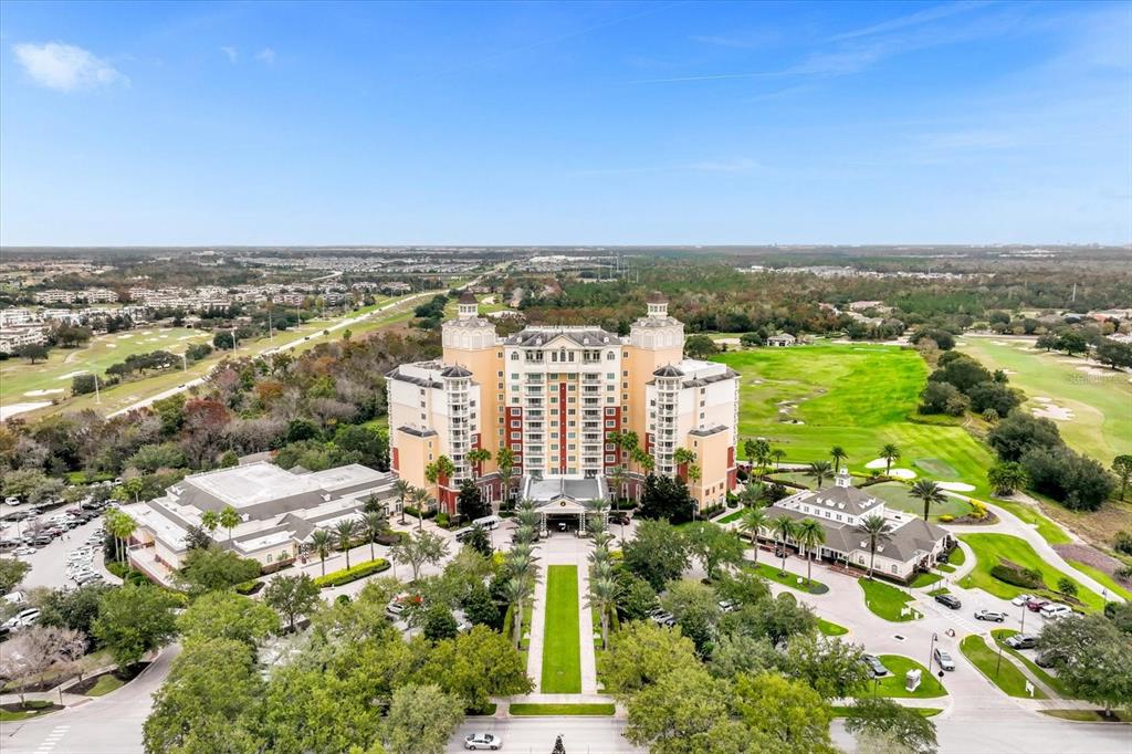 7660 Whisper Way, Unit 402 Reunion, FL 34747 - Photo 50 of 65 an aerial view of a city with lots of residential buildings