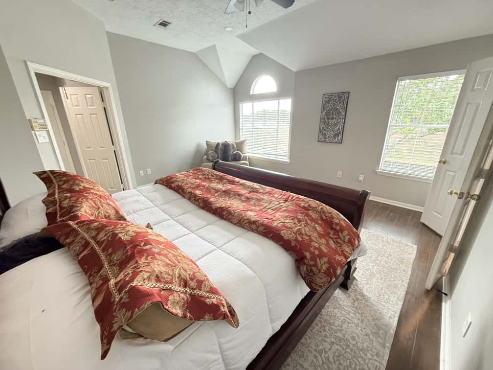 4410 Innsbrook Place Sugar Land, TX 77479 - Photo 11 of 15 a bedroom with a large bed and a window