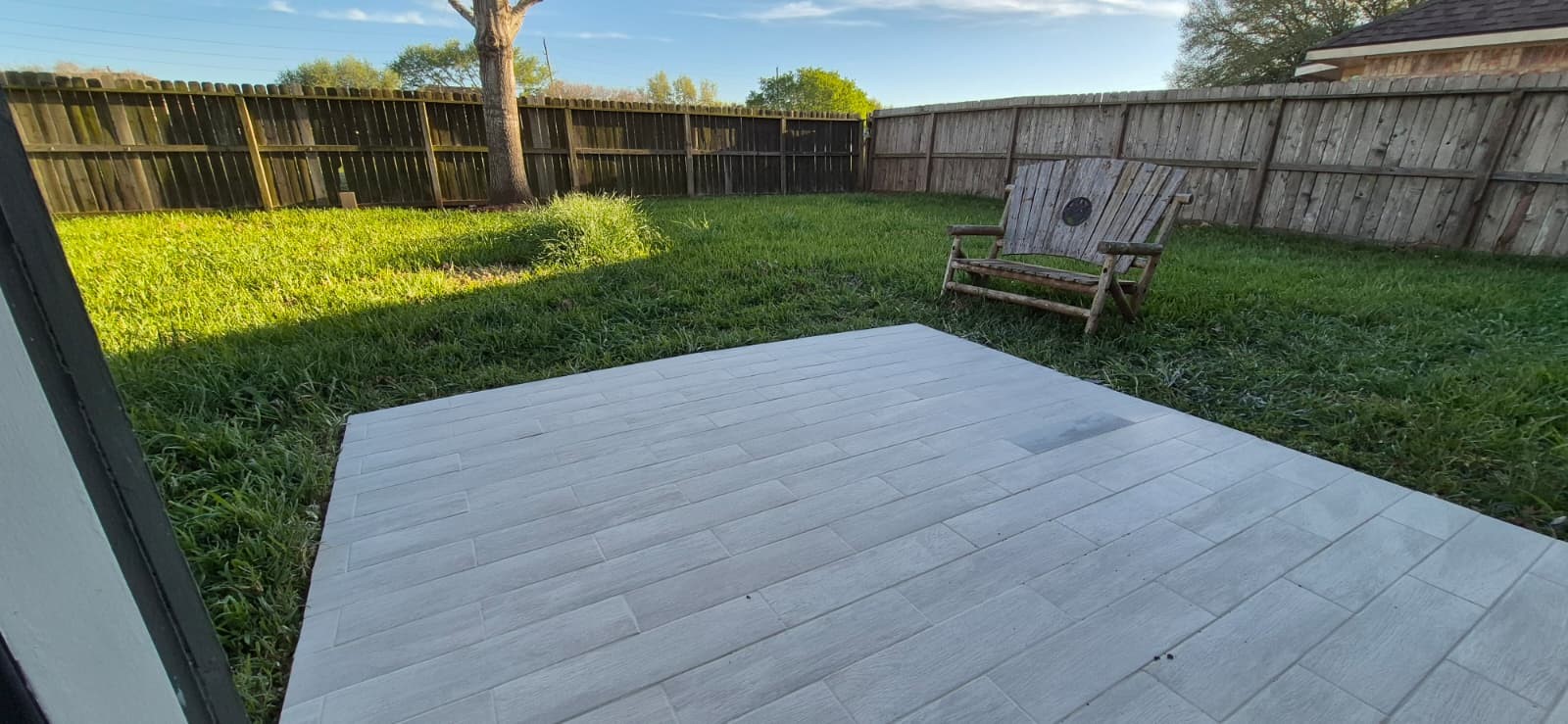 4410 Innsbrook Place Sugar Land, TX 77479 - Photo 12 of 15 a view of a backyard with chairs potted plants and wooden fence