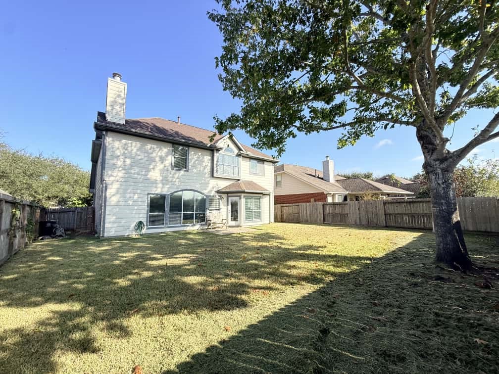 4410 Innsbrook Place Sugar Land, TX 77479 - Photo 13 of 15 a view of a house with a yard