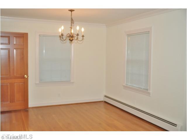 421 Kyle Road Winston-Salem, NC 27104 - Photo 5 of 16 Dining Room. The efficient heating system is heat pump as the primary source, with natural gas circulating hot water as the backup