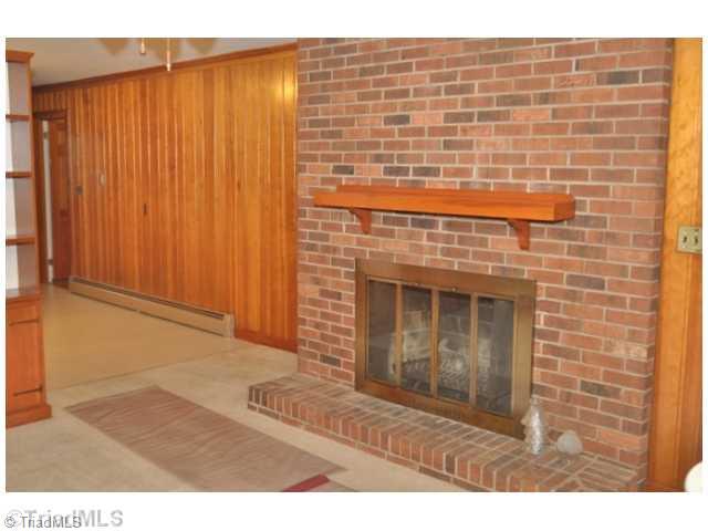 421 Kyle Road Winston-Salem, NC 27104 - Photo 7 of 16 Den/Family/Great Room. A wood burning fireplace is perfect for chilly nights spent cuddled up in the den