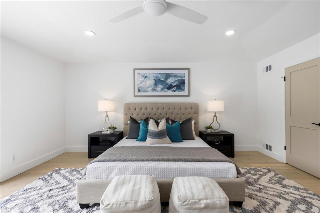 4446 Thunder Road Dallas, TX 75244 - Photo 9 of 36 Recessed ceiling lighting, wood-finish flooring, ceiling fan, and a light-colored interior door with dark hardware