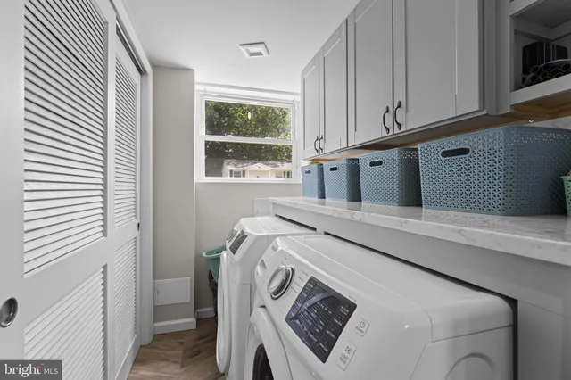 a utility room with dryer and washer