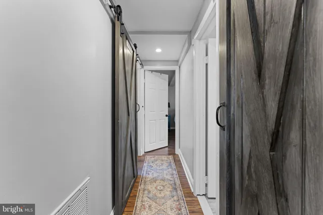 a view of hallway with shower