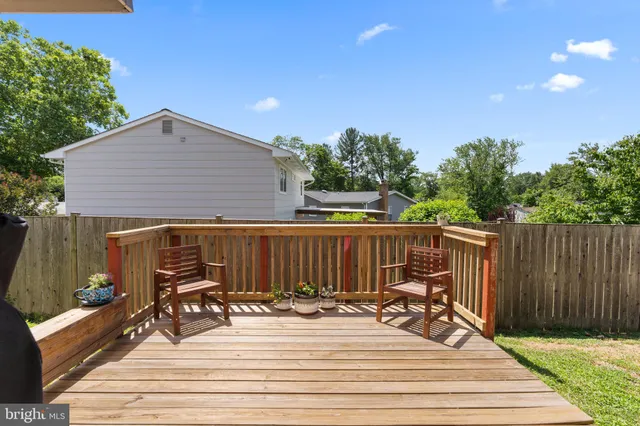 a view of a dinning table and chairs in the patio
