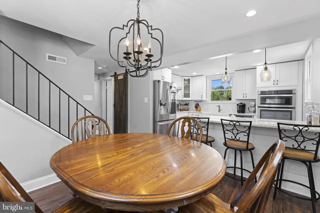 a view of a dining room with furniture