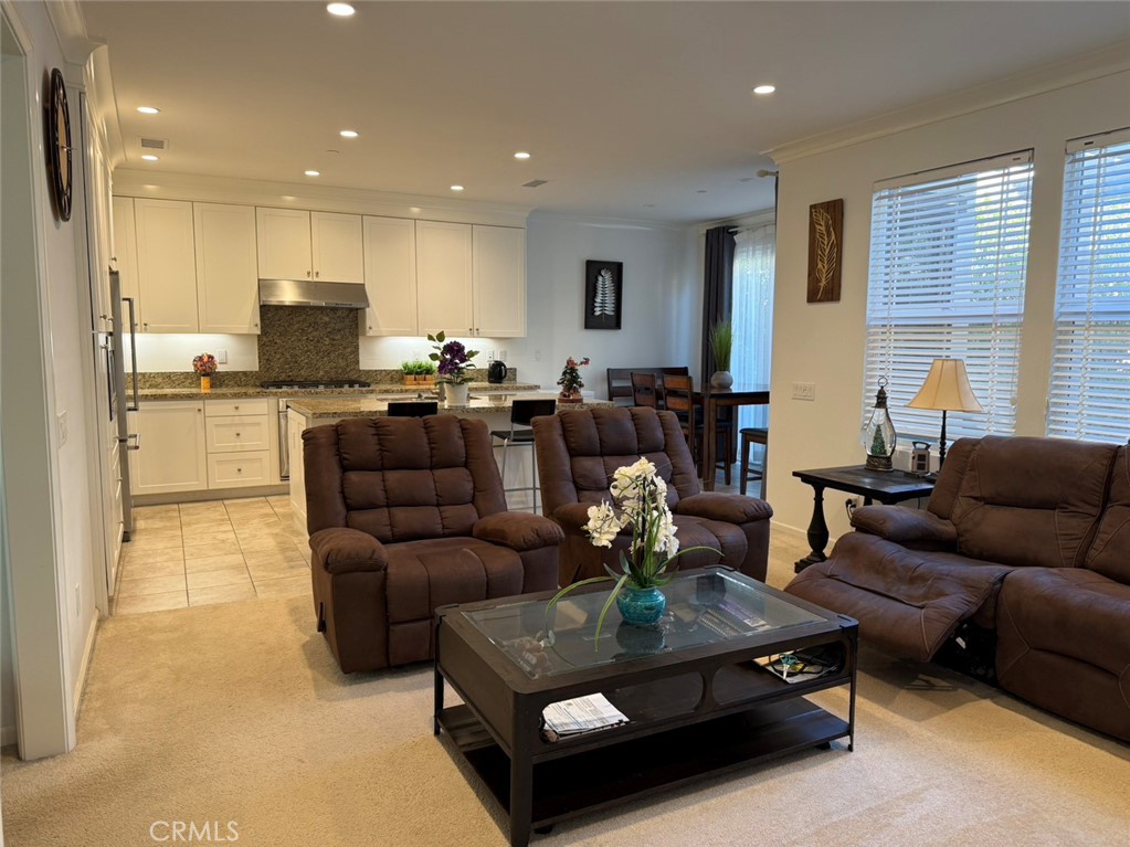 146 Working Irvine, CA 92602 - Photo 3 of 17 a living room with furniture kitchen and a table