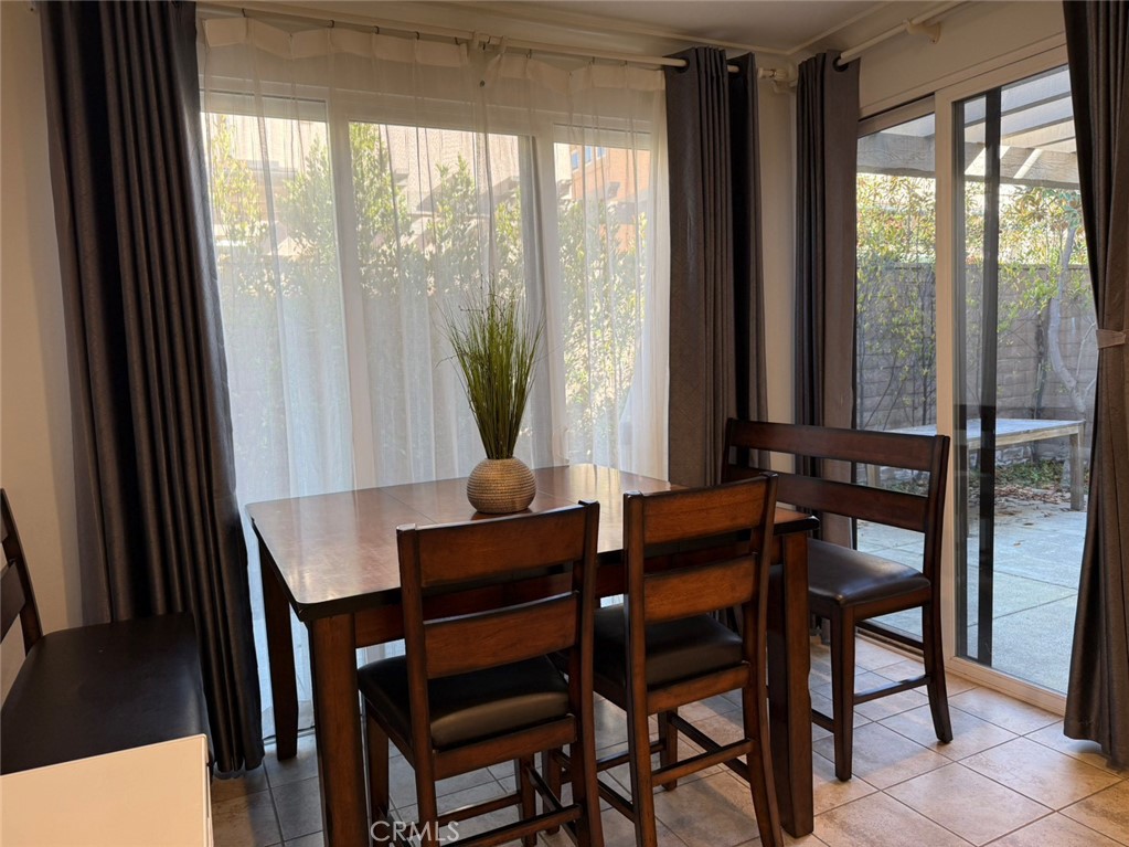 146 Working Irvine, CA 92602 - Photo 6 of 17 a view of a dining room with furniture and window