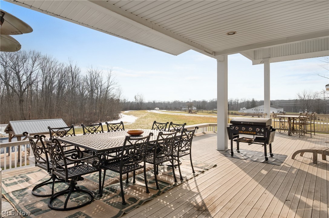 9419 Robinson Road Chardon, OH 44024 - Photo 40 of 46 Wooden terrace featuring outdoor dining area and area for grilling