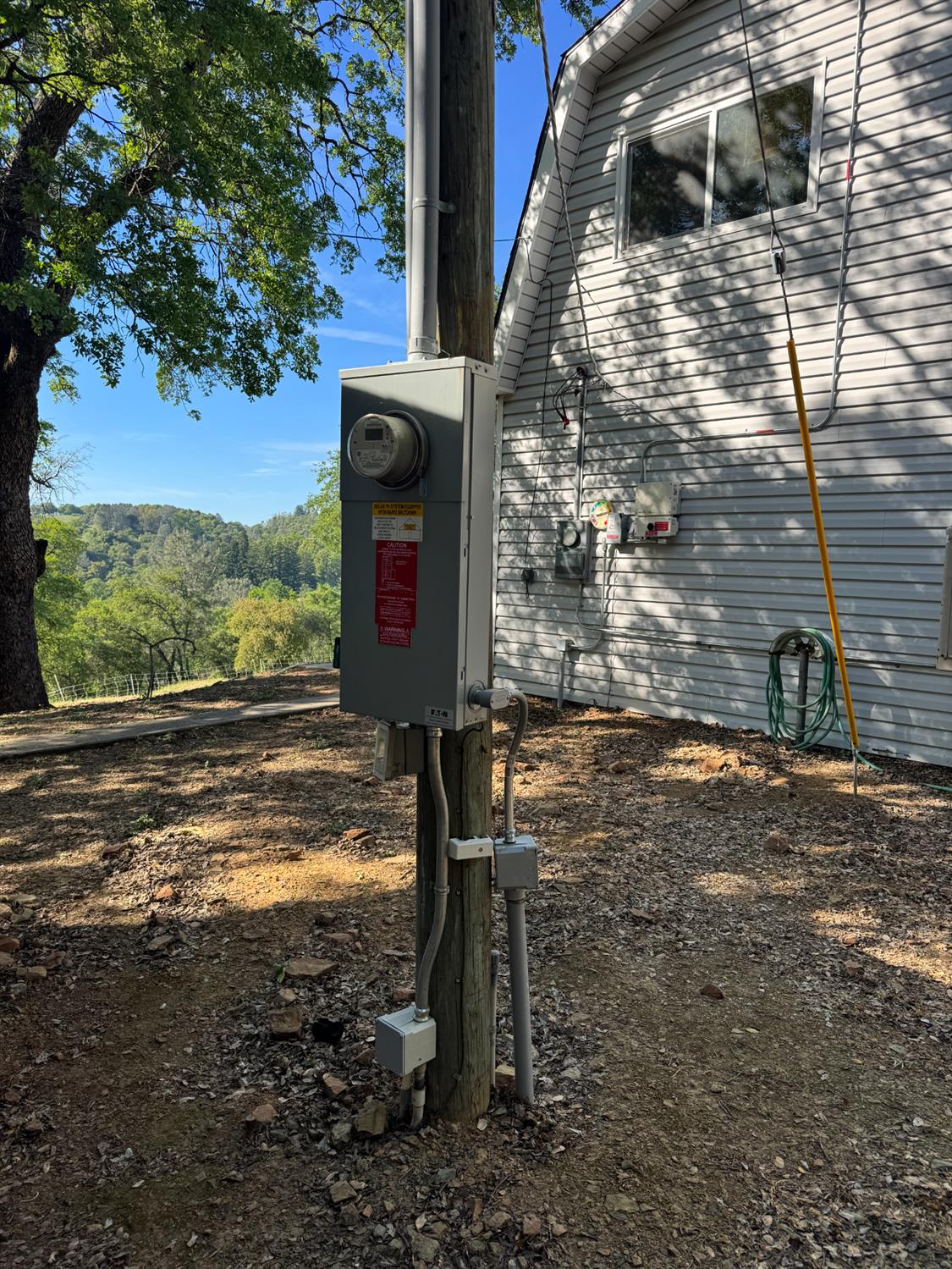 670 Stone House Road Auburn, CA 95603 - Photo 11 of 46 a backyard of a house with lots of green space
