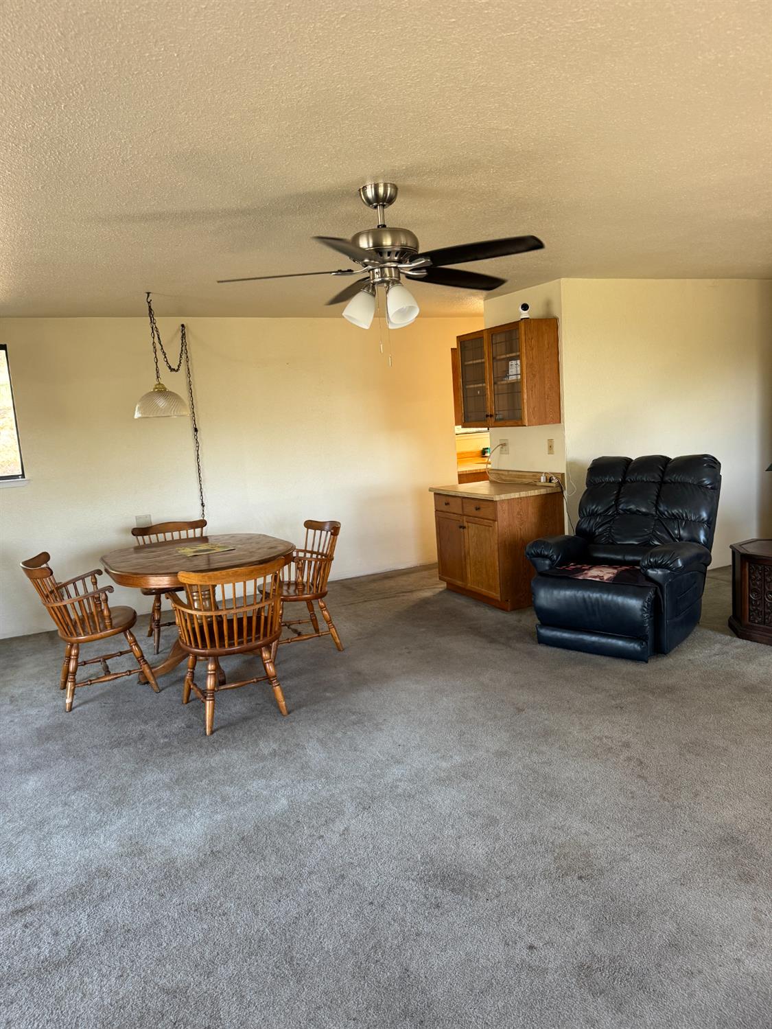670 Stone House Road Auburn, CA 95603 - Photo 21 of 46 a living room with furniture and a flat screen tv