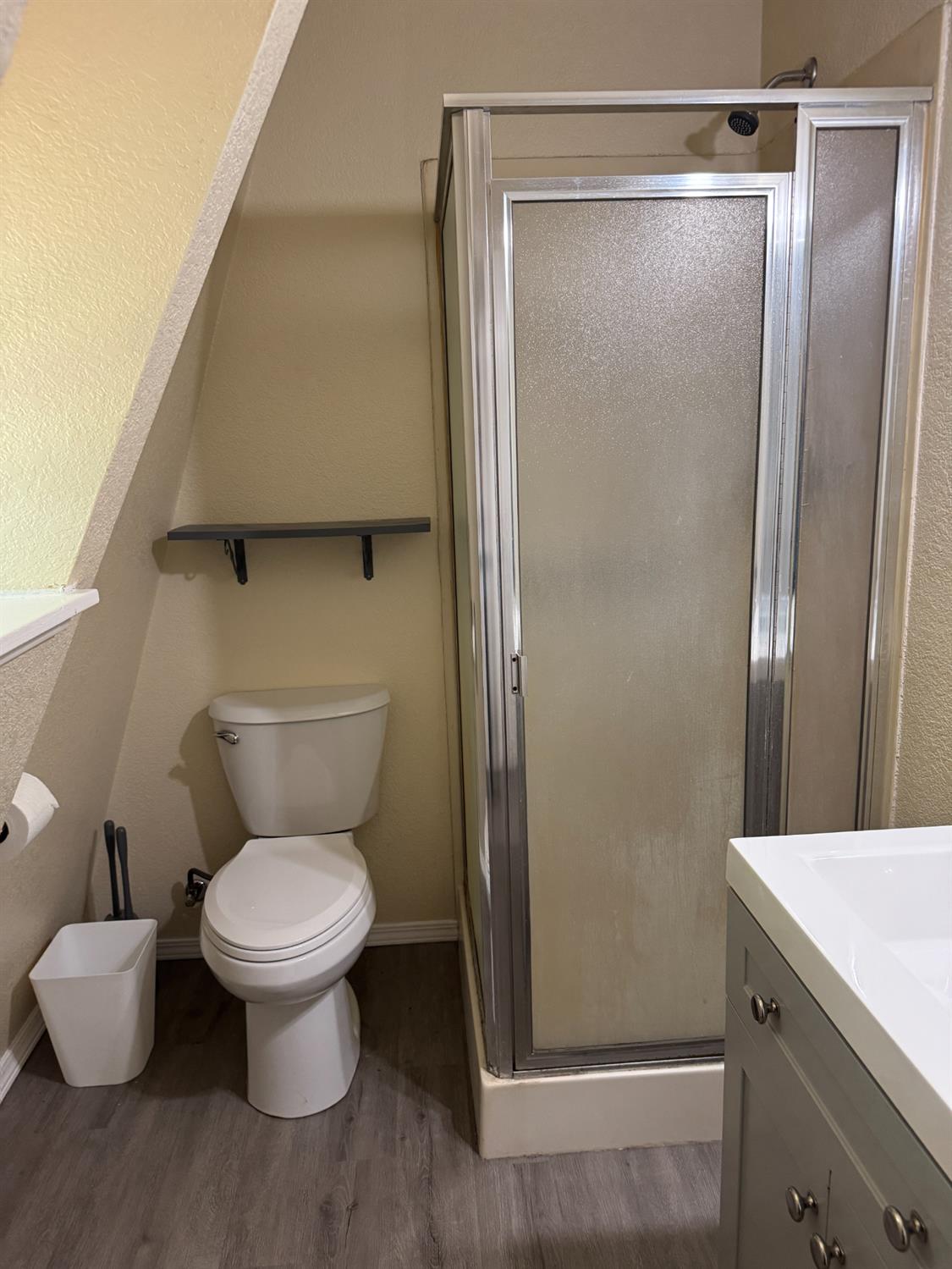 670 Stone House Road Auburn, CA 95603 - Photo 35 of 46 a bathroom with a toilet and a mirror