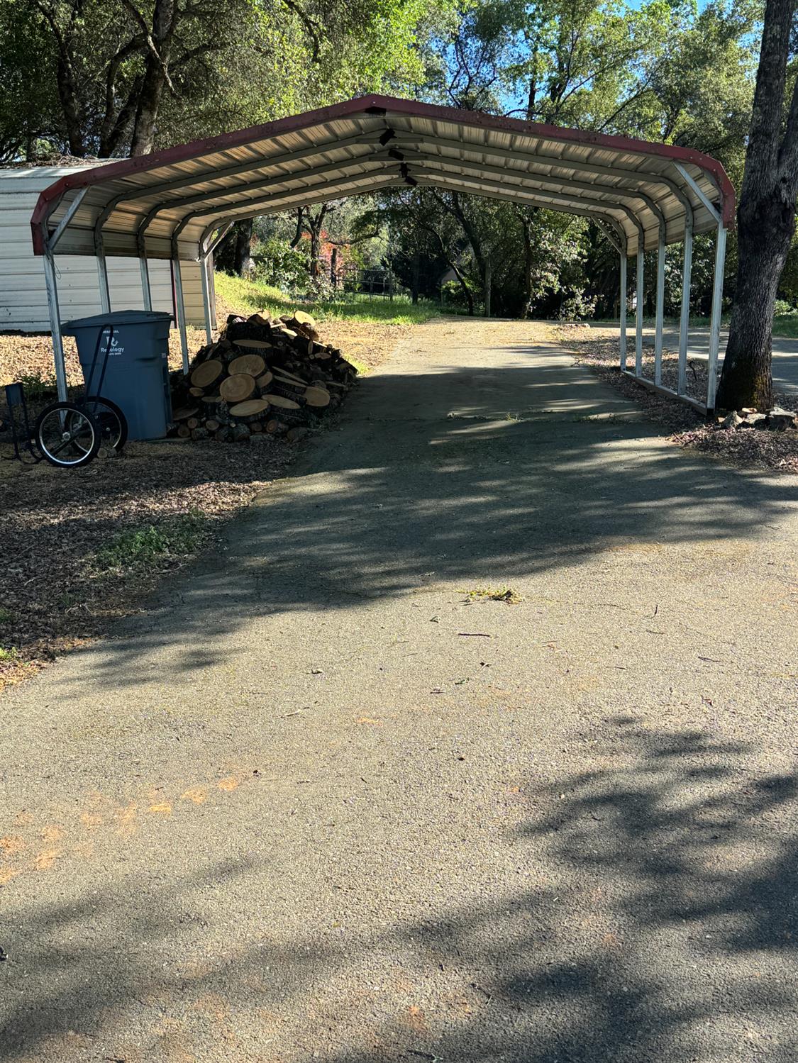 670 Stone House Road Auburn, CA 95603 - Photo 38 of 46 a view of backyard with swimming pool and trees