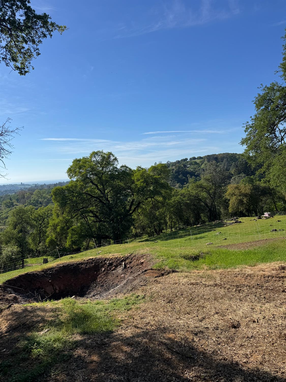 670 Stone House Road Auburn, CA 95603 - Photo 46 of 46 a view of a field with an trees