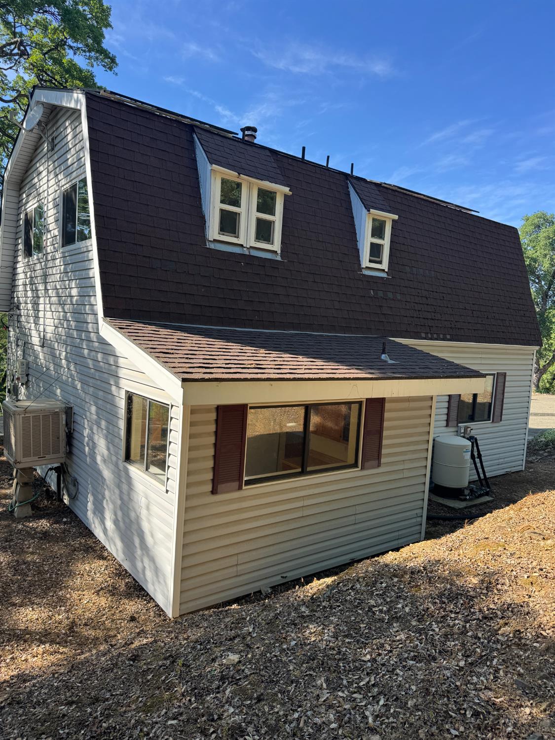 670 Stone House Road Auburn, CA 95603 - Photo 6 of 46 a view of a house with a backyard