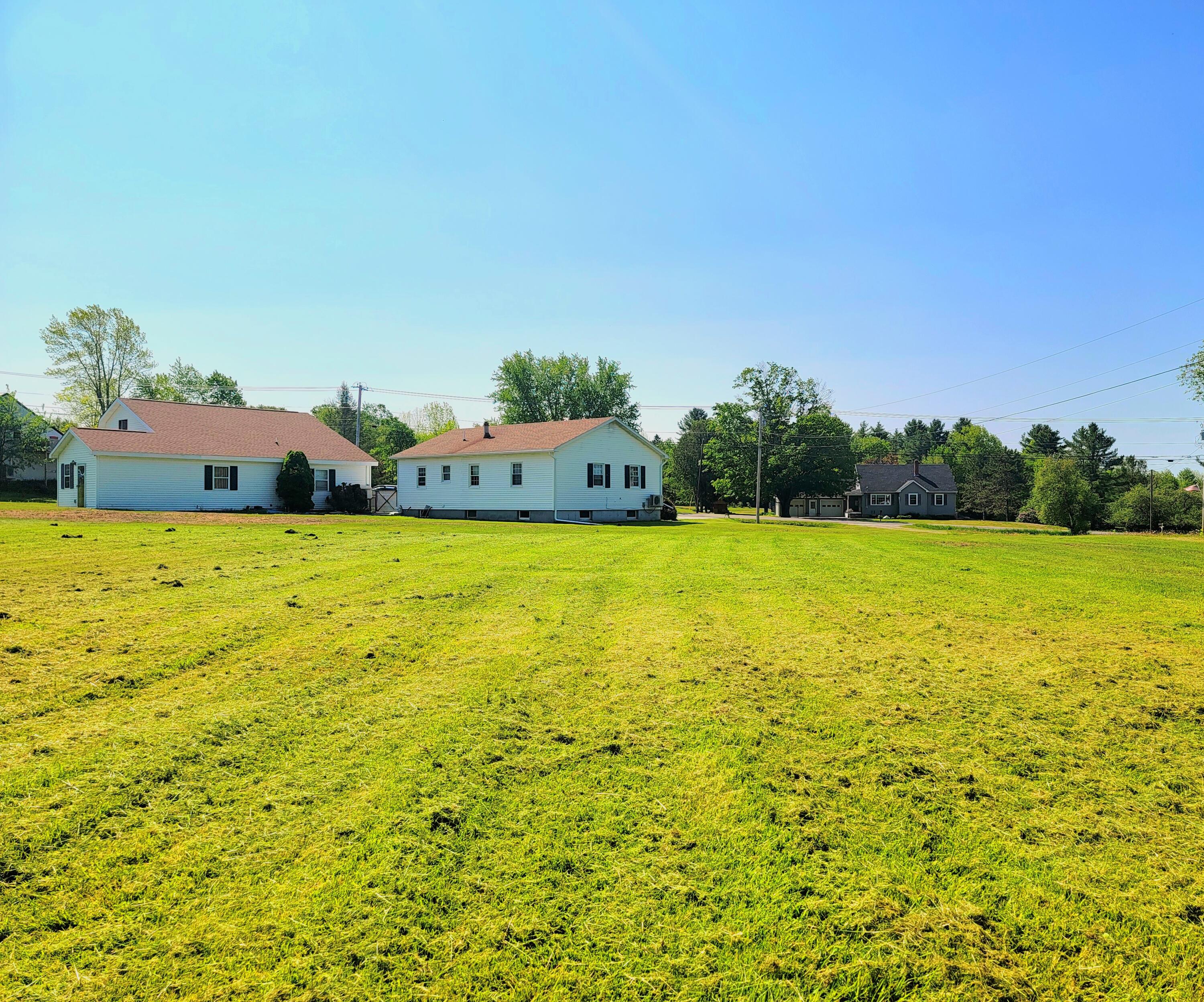 101 Exeter Road Corinth, ME 04427 - Photo 5 of 46 Backyard Side View