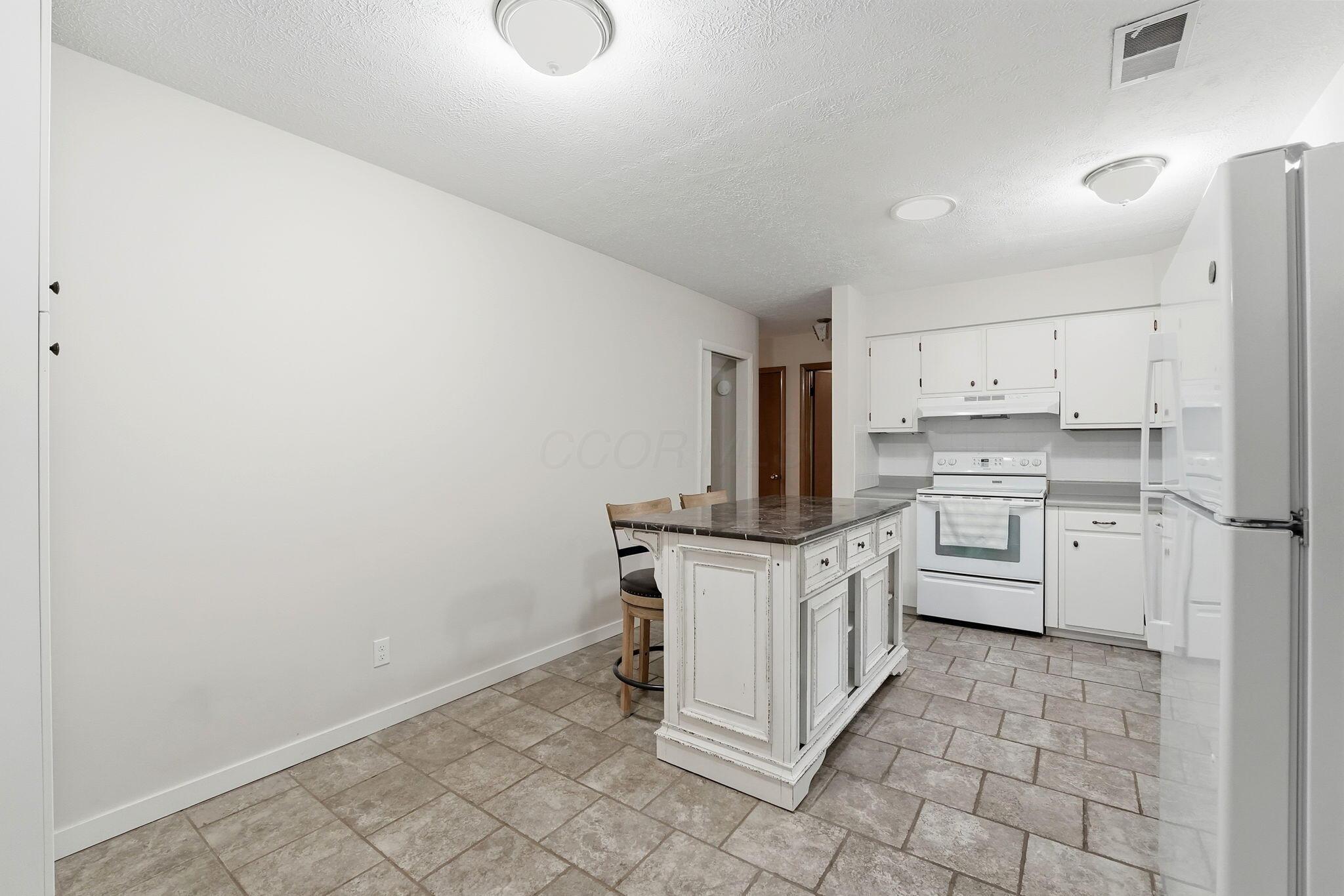 854 South Section Line Road Delaware, OH 43015 - Photo 16 of 60 Kitchen-Island is portable