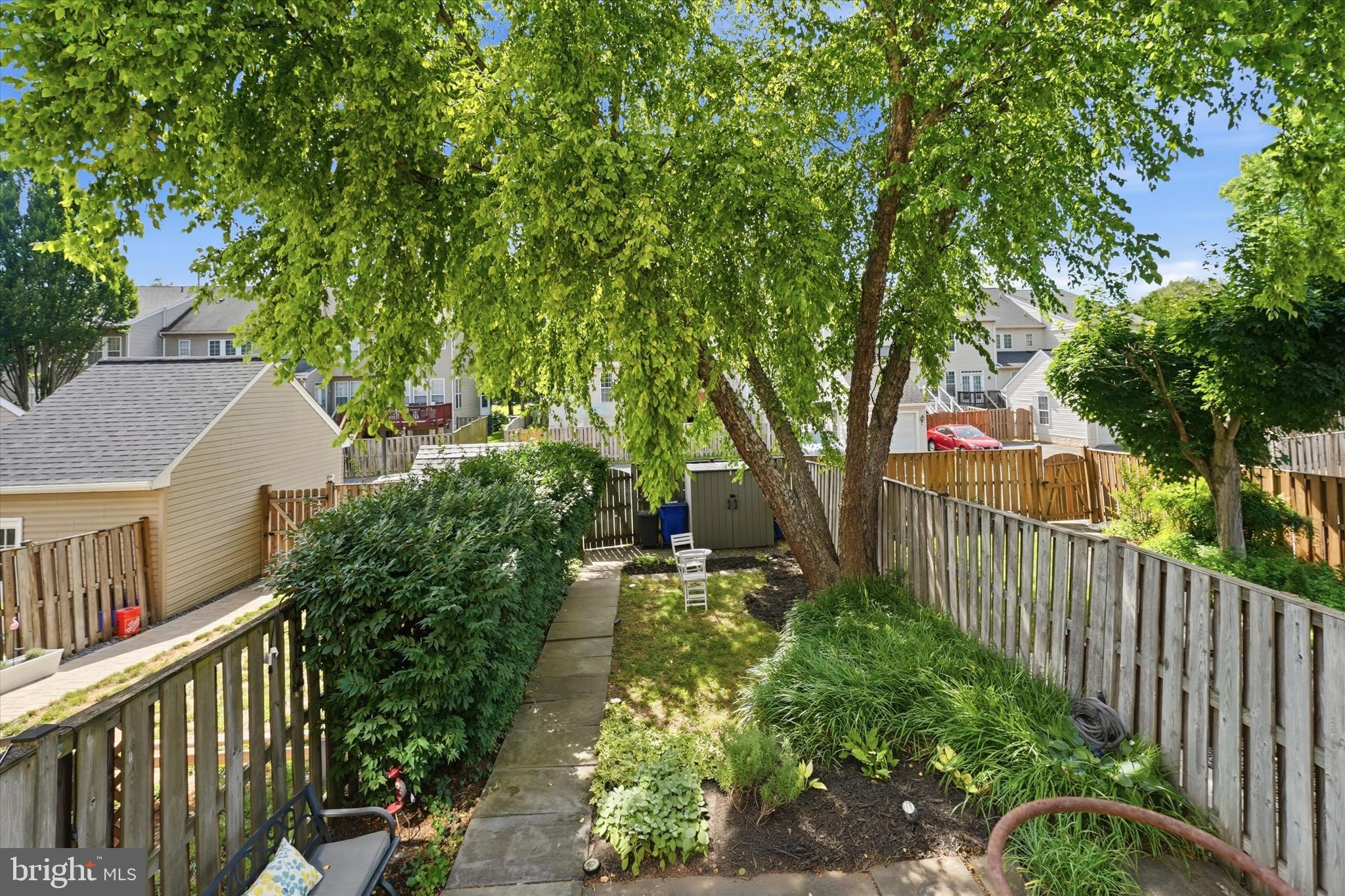 1721 Algonquin Road Frederick, MD 21701 - Photo 42 of 51 Fenced Backyard with Patio - Walkway to Parking