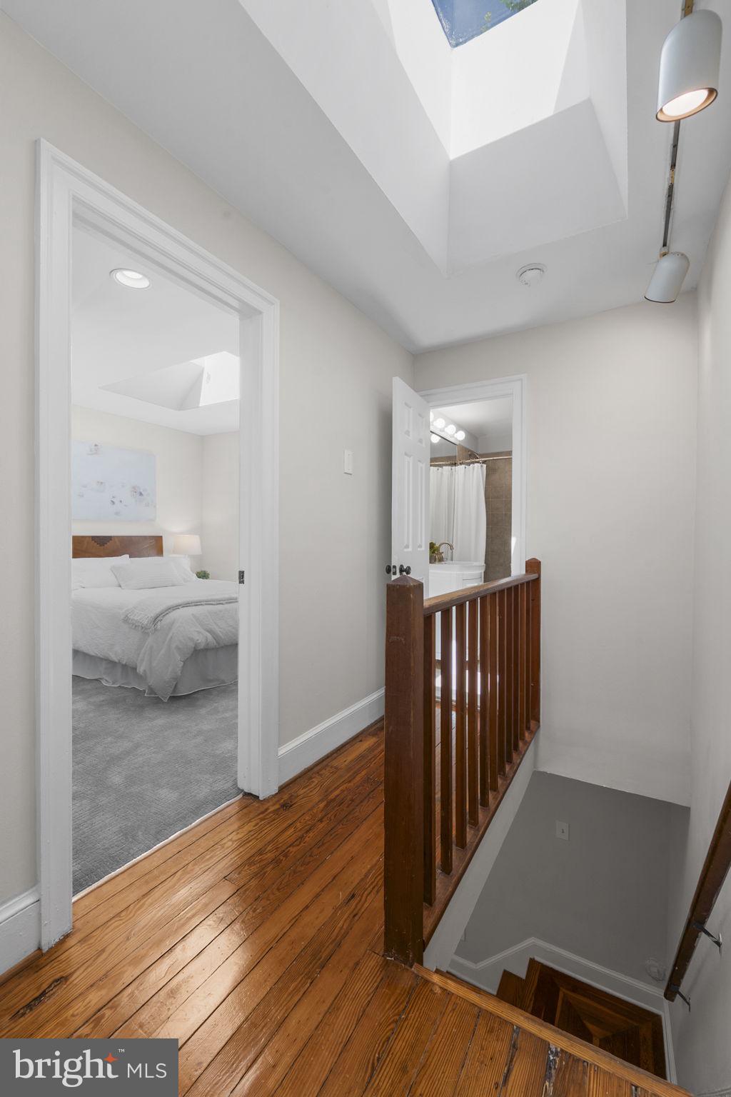 914 15th Street Southeast Washington, DC 20003 - Photo 18 of 37 a view of a hallway with wooden floor and furniture