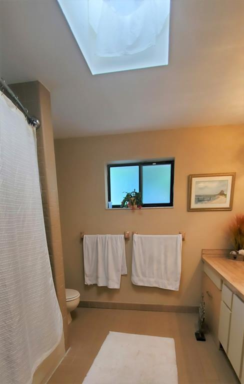 817 Southeast 12th Court, Unit 1 Fort Lauderdale, FL 33316 - Photo 13 of 25 a bathroom with a bathtub and shower