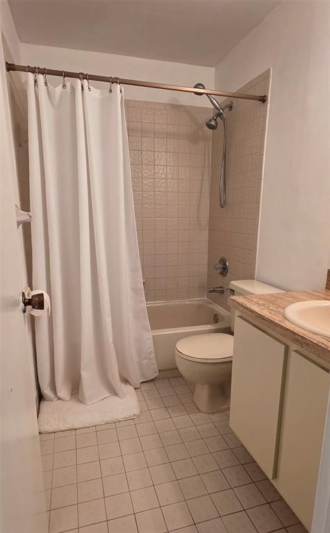 817 Southeast 12th Court, Unit 1 Fort Lauderdale, FL 33316 - Photo 14 of 25 a bathroom with a granite countertop sink toilet and a shower