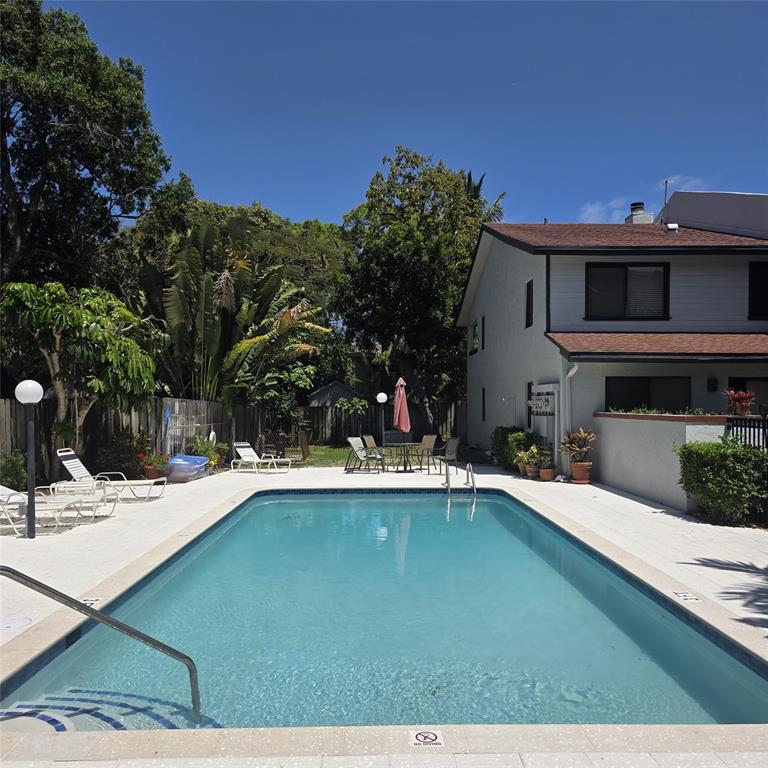 817 Southeast 12th Court, Unit 1 Fort Lauderdale, FL 33316 - Photo 21 of 25 a view of a house with swimming pool