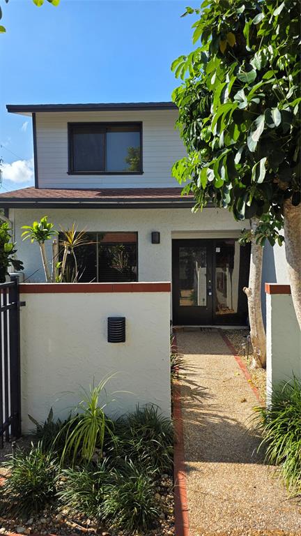 817 Southeast 12th Court, Unit 1 Fort Lauderdale, FL 33316 - Photo 25 of 25 a front view of a house with garden