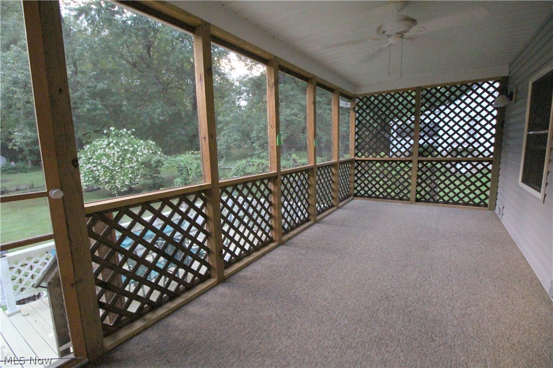 1930 Knight Road Akron, OH 44306 - Photo 21 of 25 Screened deck - located adjacent to the four season room, this oversized screened-in deck area with ceiling fan is a great place to relax on those warm summer evenings without getting bitten by mosquitos!