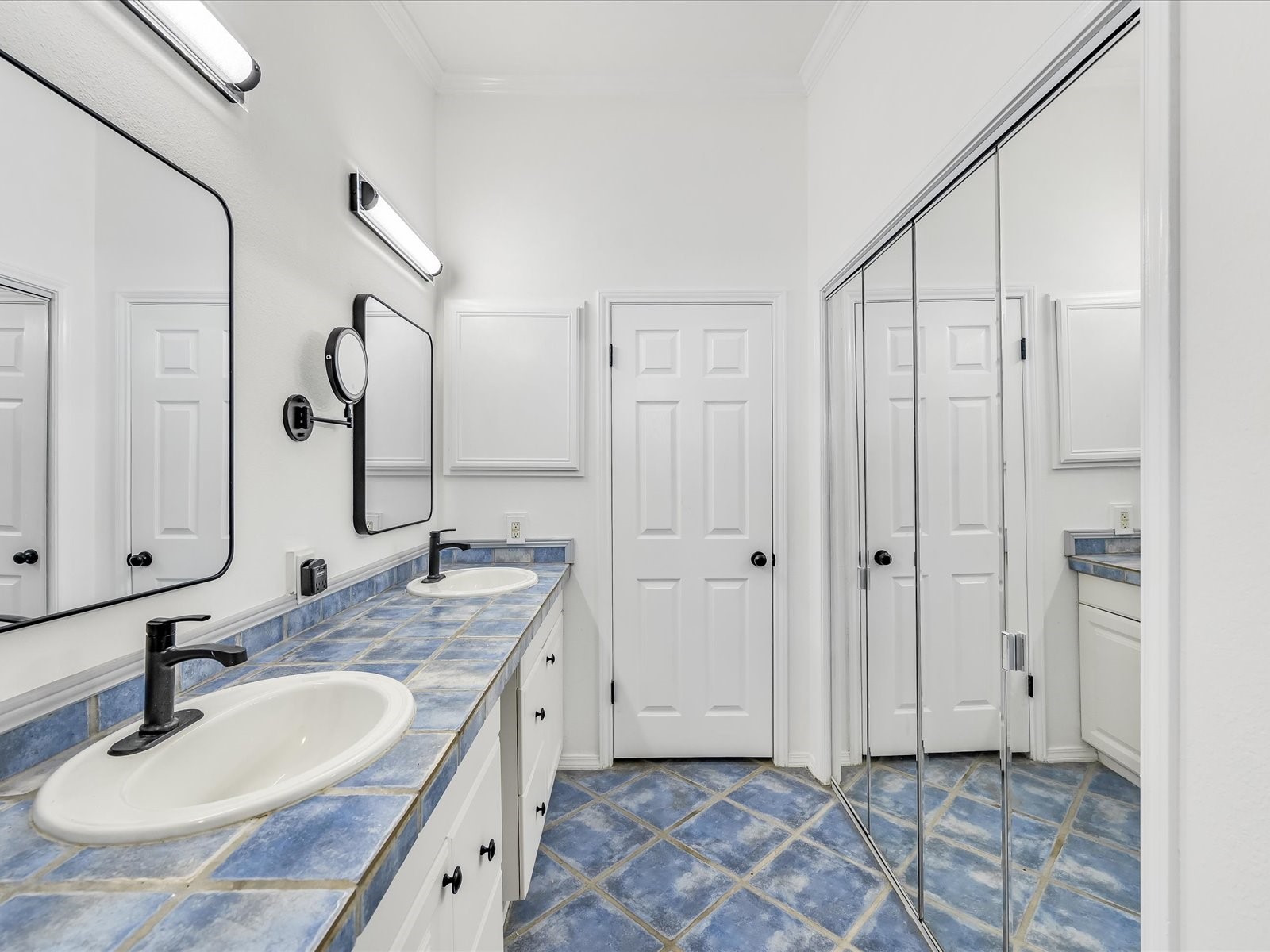 2712 Geronimo Trail Austin, TX 78734 - Photo 17 of 31 a bathroom with a sink double vanity and a mirror
