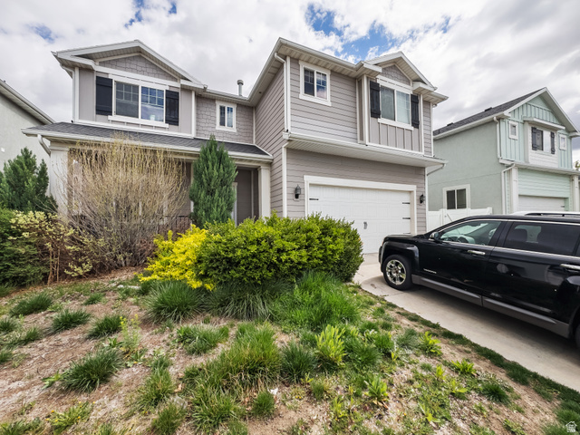 42 North Rue Borda Vineyard, UT 84059 - Photo 1 of 1 Craftsman-style home with an attached garage and concrete driveway