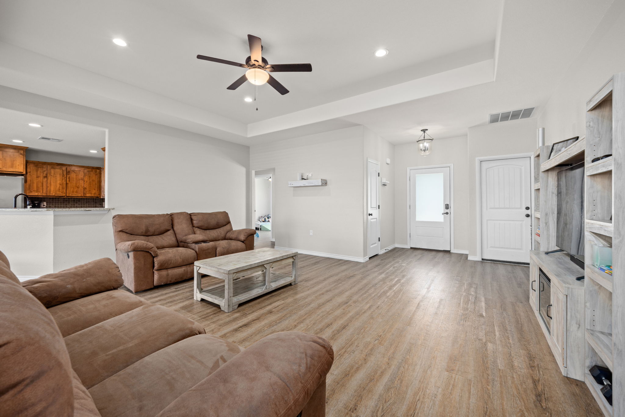 1313 Sandstone Cove Lampasas, TX 76550 - Photo 3 of 25 a living room with furniture and a wooden floor