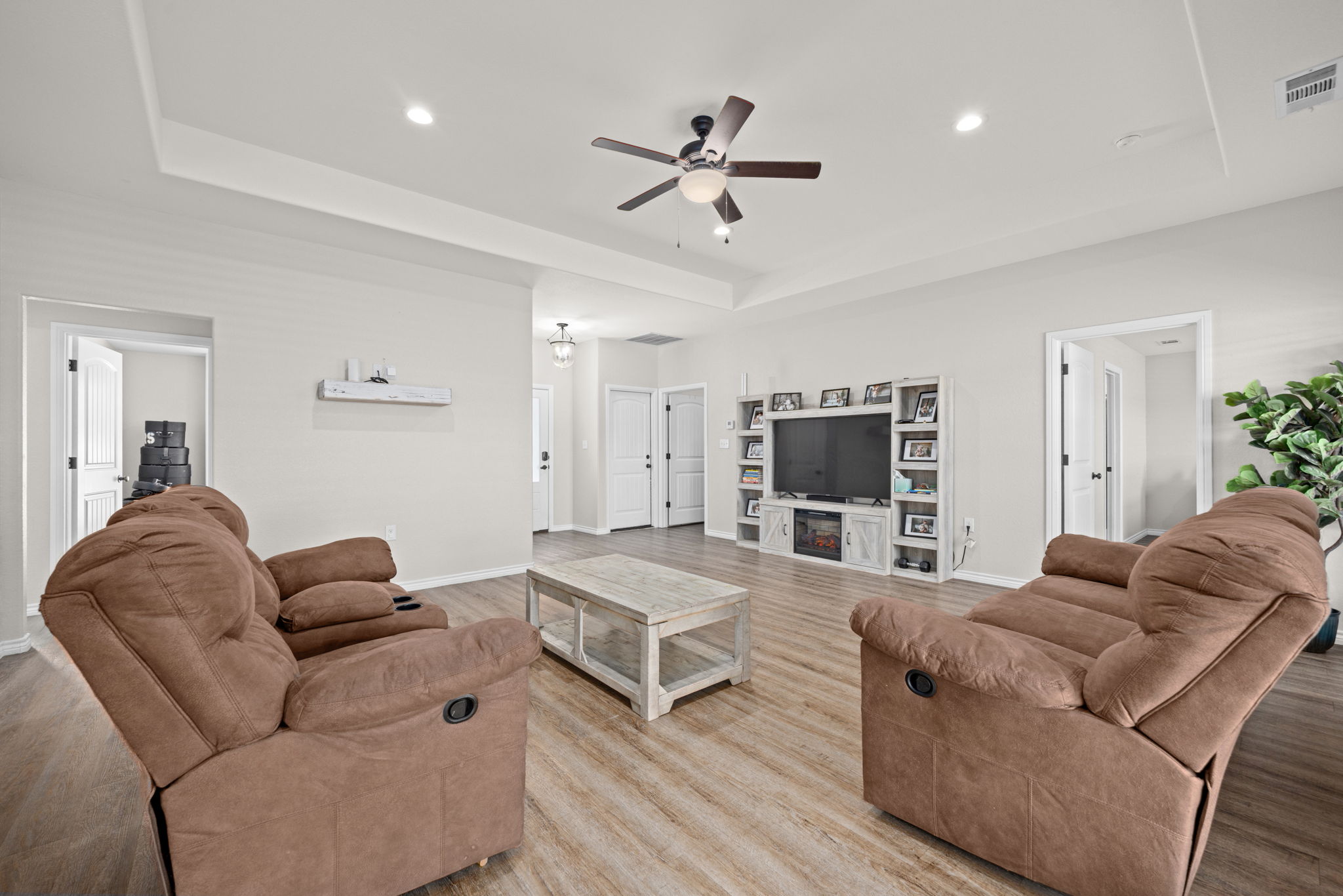 1313 Sandstone Cove Lampasas, TX 76550 - Photo 4 of 25 a living room with furniture and a flat screen tv