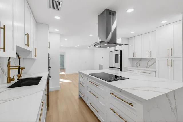 a utility room with closet dryer and washer